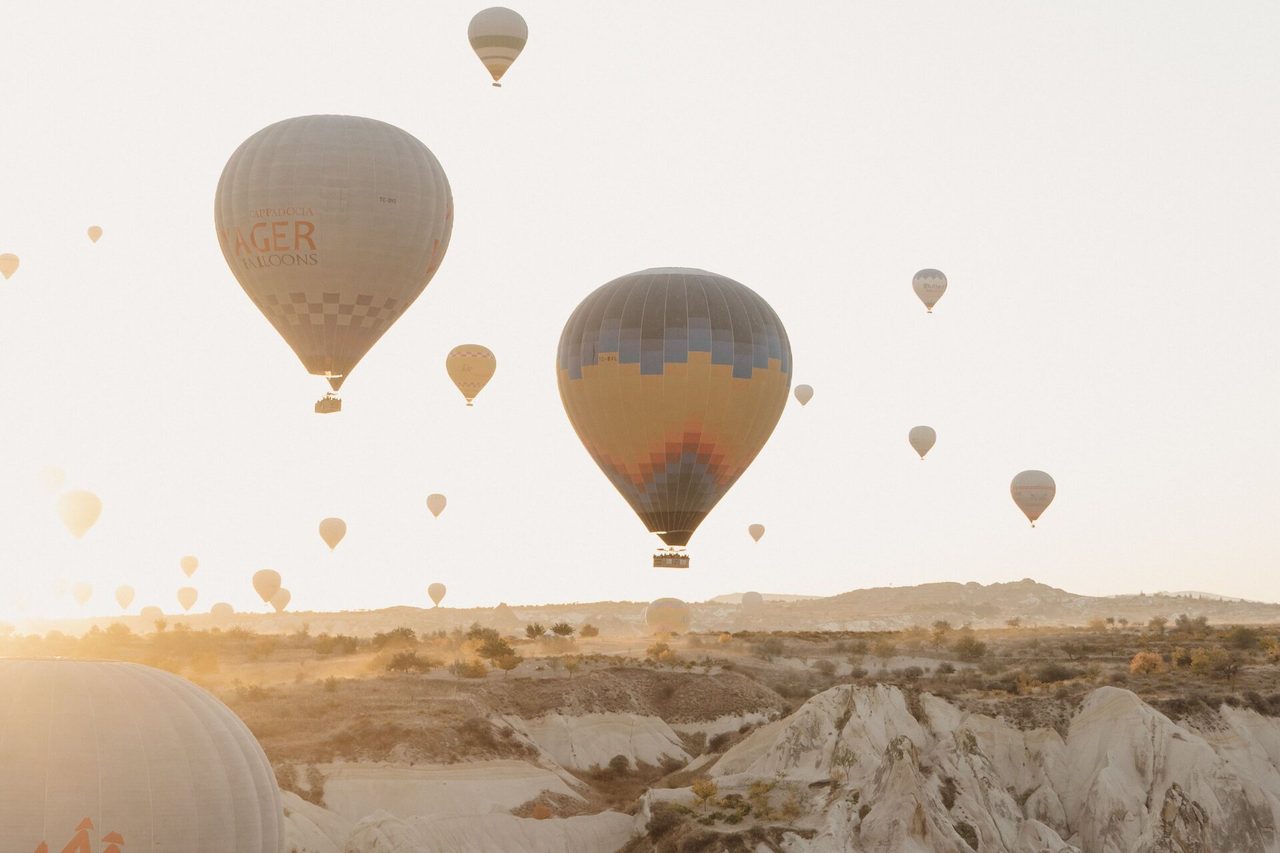 Hot-air balloons over the valleys of Cappadocia at sunrise